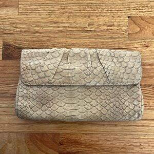 LAUREN MERKIN gold embossed python clutch